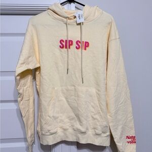 Cream Hoodie with Pink 'SIP SIP' Graphic